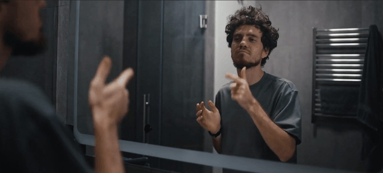 confident man in the mirror